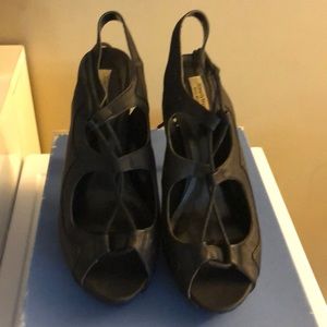 Black open toe lace pumps